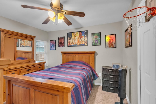 bedroom featuring ceiling fan and light colored carpet