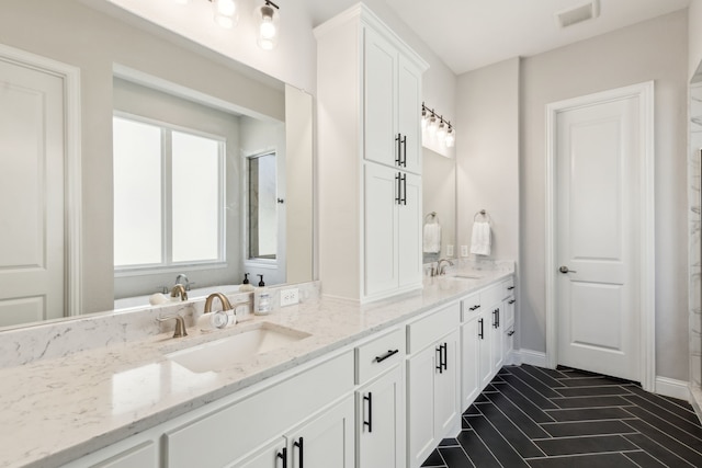 bathroom featuring vanity