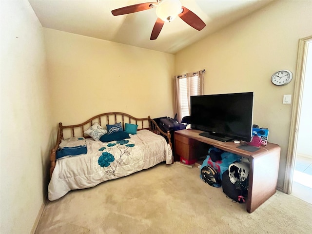 bedroom with ceiling fan and carpet floors