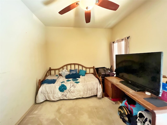 bedroom featuring ceiling fan and light colored carpet