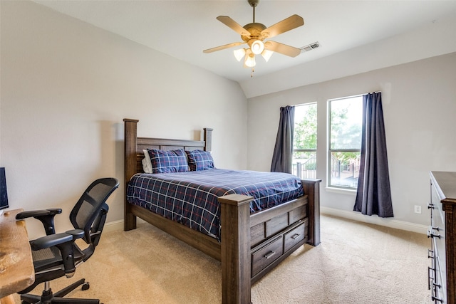 bedroom with baseboards, visible vents, light colored carpet, and ceiling fan