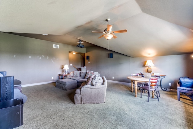 living room featuring carpet floors, lofted ceiling, and ceiling fan