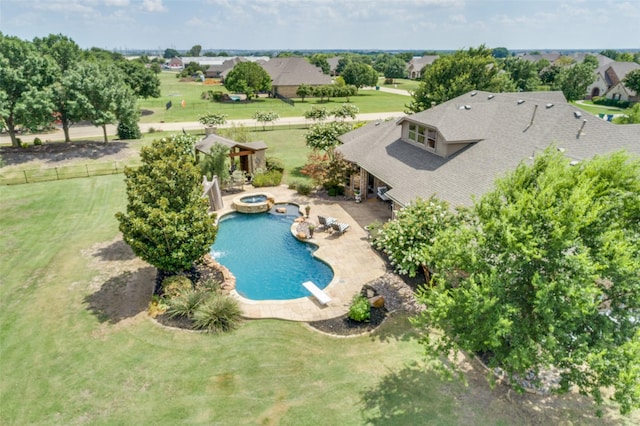 view of swimming pool featuring an in ground hot tub, a patio area, a lawn, and a diving board