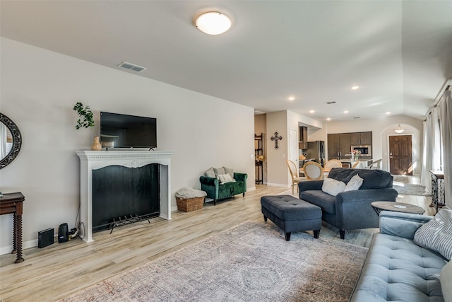 living room with light hardwood / wood-style floors