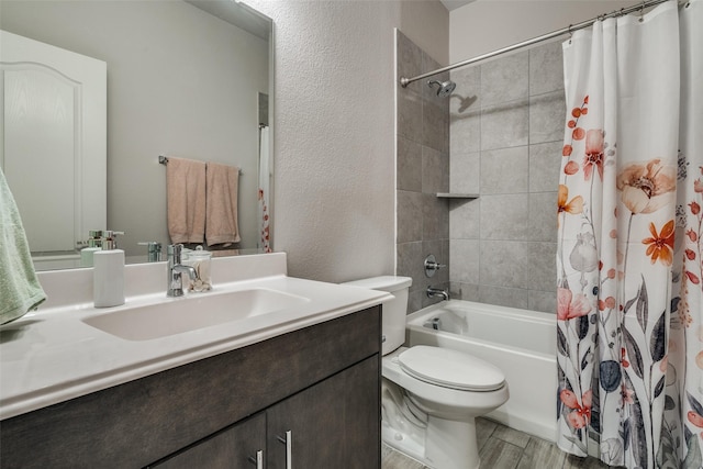 full bathroom featuring toilet, shower / tub combo, hardwood / wood-style flooring, and vanity