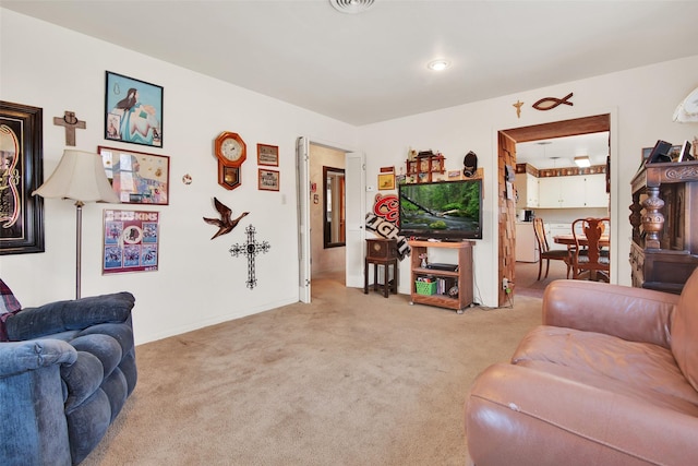 living room with light colored carpet