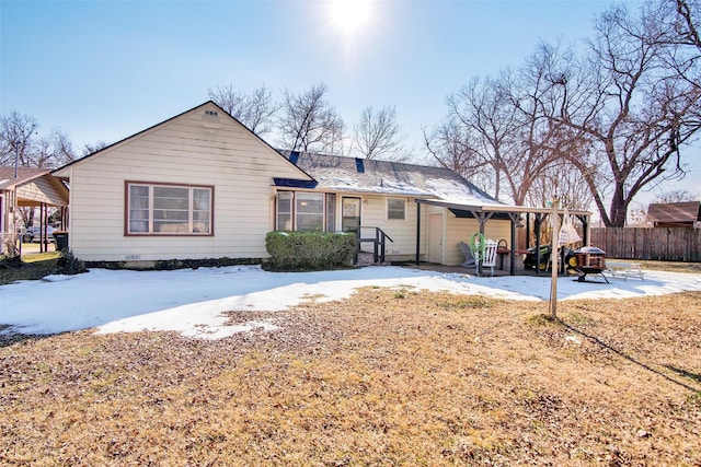 view of front of home with a carport