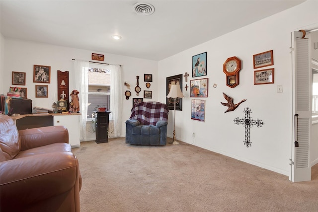 living room featuring light carpet