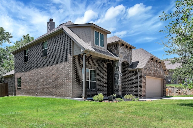 view of front facade featuring a garage and a front yard