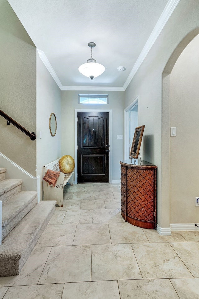 foyer entrance with ornamental molding