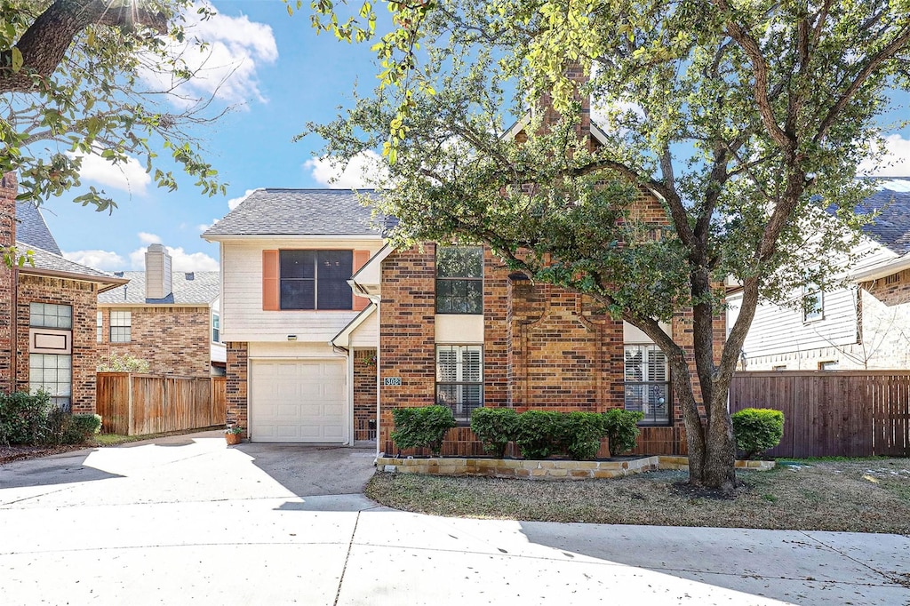 front facade with a garage