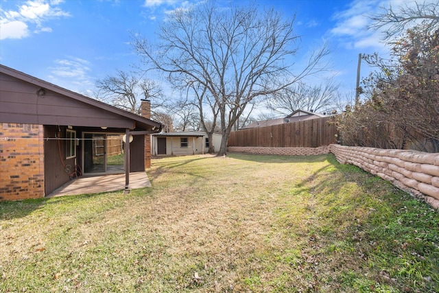 view of yard with a patio area and fence