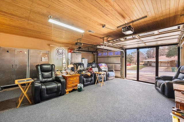 garage featuring a garage door opener and wooden ceiling