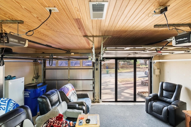 garage featuring refrigerator, wooden ceiling, visible vents, and a garage door opener