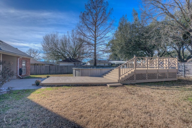 view of yard featuring a deck