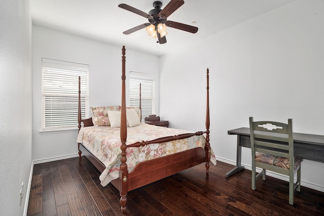 bedroom featuring a ceiling fan, baseboards, and wood-type flooring