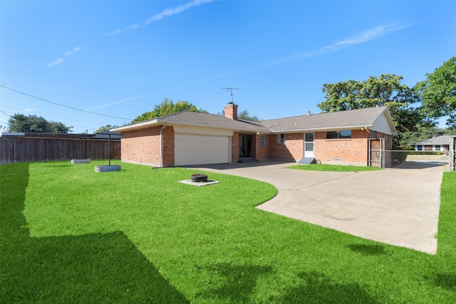 ranch-style house with a front lawn and a garage