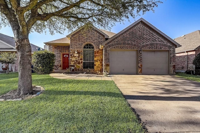 view of front facade with a garage and a front lawn