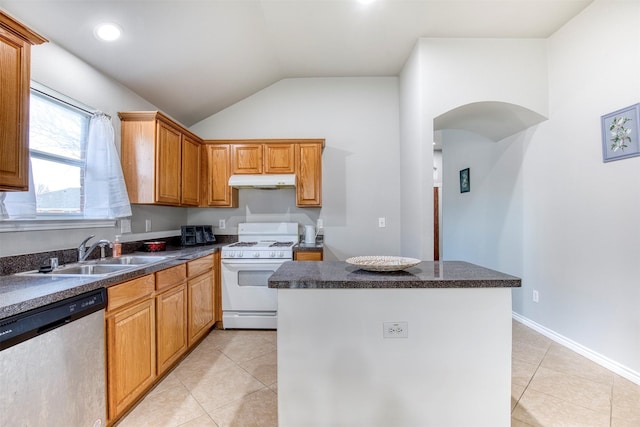 kitchen with gas range gas stove, sink, vaulted ceiling, stainless steel dishwasher, and a center island