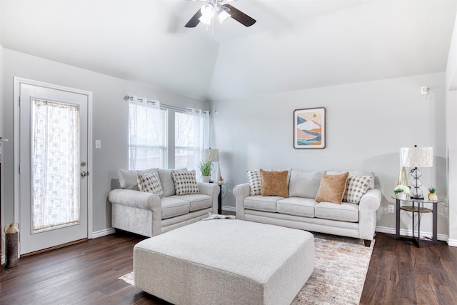 living room with dark wood-type flooring, ceiling fan, and lofted ceiling