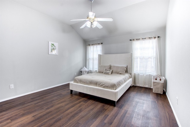 bedroom with ceiling fan, dark hardwood / wood-style floors, and lofted ceiling