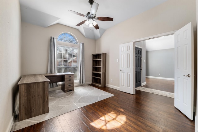 unfurnished office with ceiling fan, lofted ceiling, and hardwood / wood-style floors