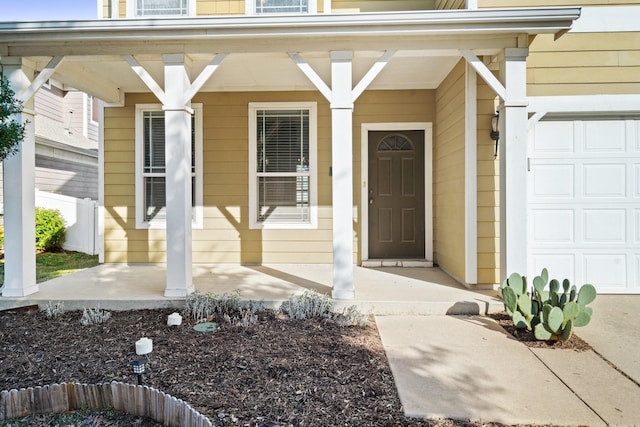 doorway to property featuring covered porch