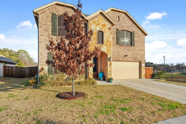 view of front of home with a front lawn and a garage