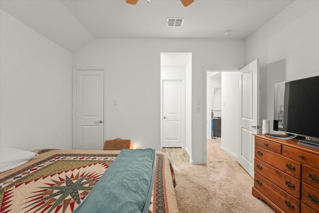 bedroom featuring ceiling fan and light colored carpet