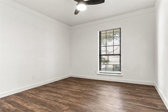 unfurnished room with dark wood-type flooring, ceiling fan, and ornamental molding