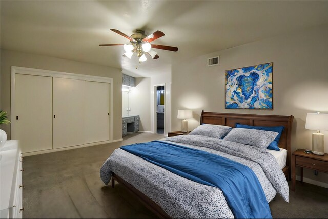 unfurnished room with ceiling fan and dark wood-type flooring