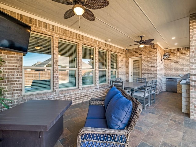 view of patio / terrace featuring ceiling fan and area for grilling