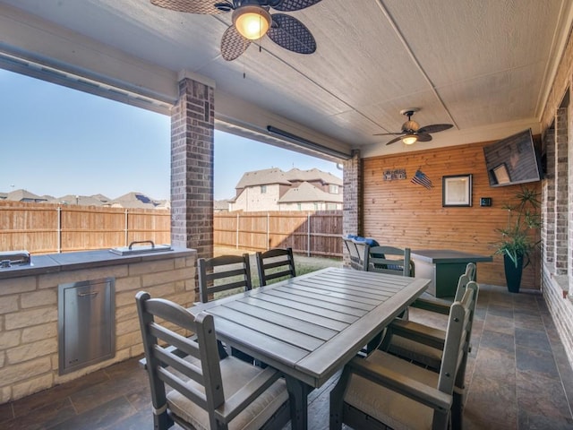 view of patio featuring ceiling fan