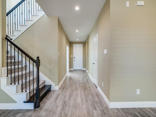 foyer entrance featuring light hardwood / wood-style floors