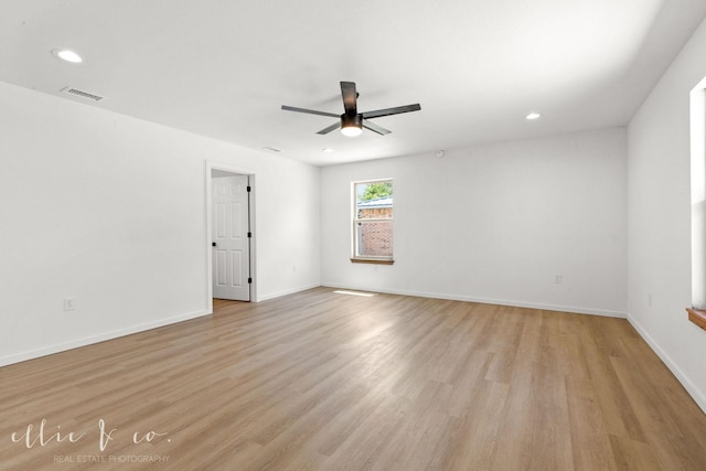 unfurnished room with ceiling fan and light hardwood / wood-style flooring