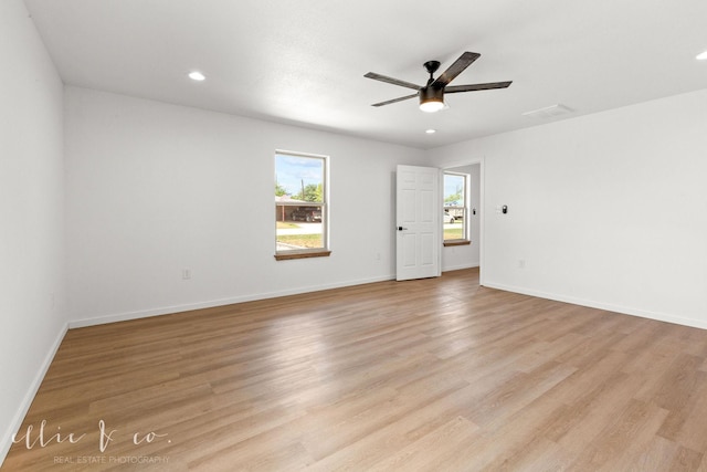 unfurnished room featuring light hardwood / wood-style floors and ceiling fan