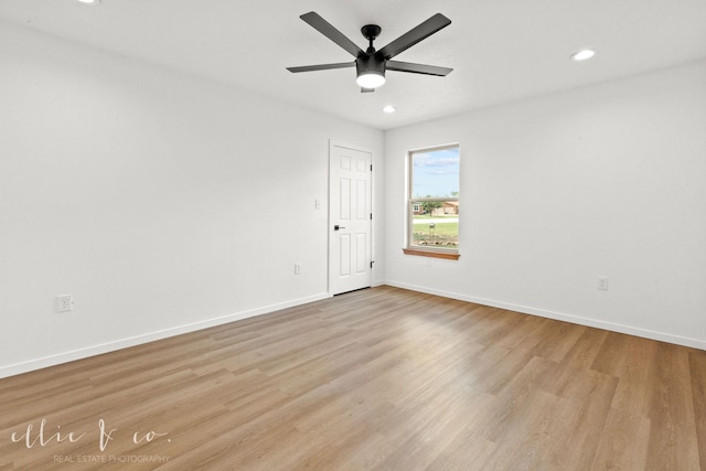 empty room featuring ceiling fan and light wood-type flooring