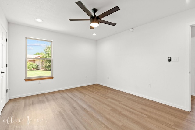 unfurnished room with ceiling fan and light hardwood / wood-style floors