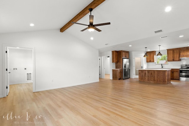 unfurnished living room with ceiling fan, light hardwood / wood-style flooring, vaulted ceiling with beams, and sink