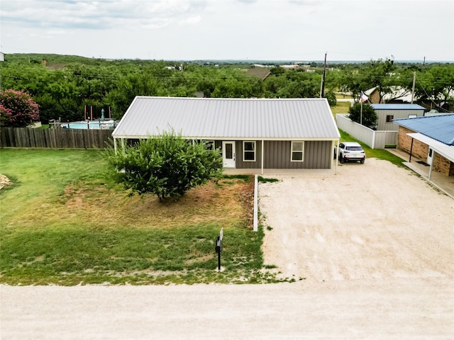 view of front of home with a front yard