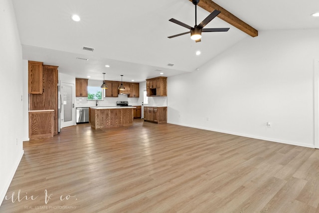 unfurnished living room featuring ceiling fan, light hardwood / wood-style flooring, vaulted ceiling with beams, and sink