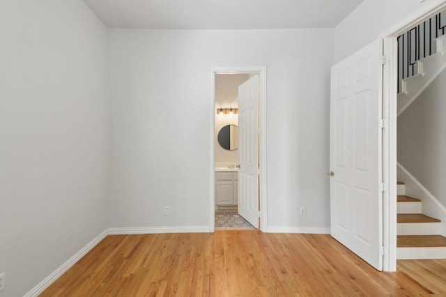 unfurnished bedroom with light hardwood / wood-style flooring