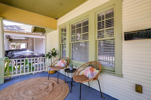 balcony featuring a porch