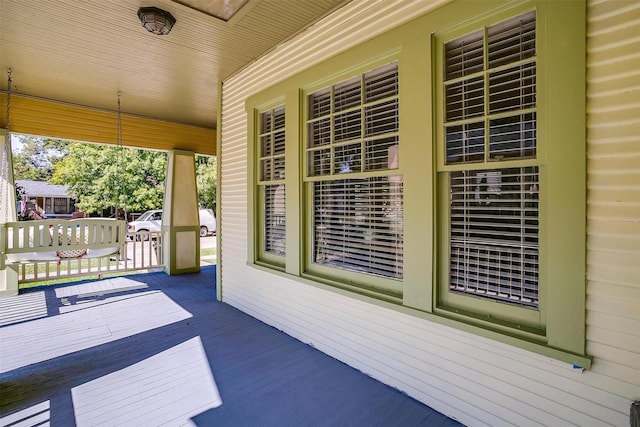 wooden terrace with covered porch