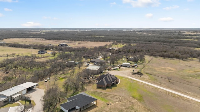 birds eye view of property featuring a rural view