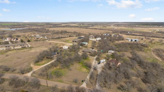 birds eye view of property featuring a rural view