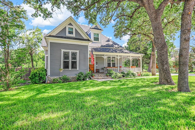 view of front of house featuring a front lawn and a porch