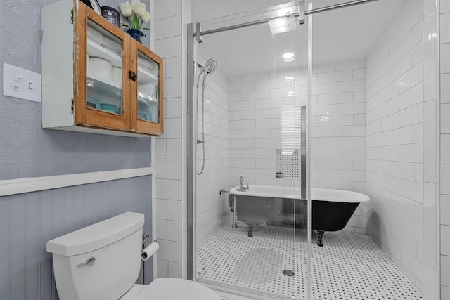 bathroom with toilet and separate shower and tub