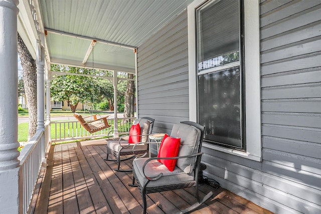 deck featuring a porch