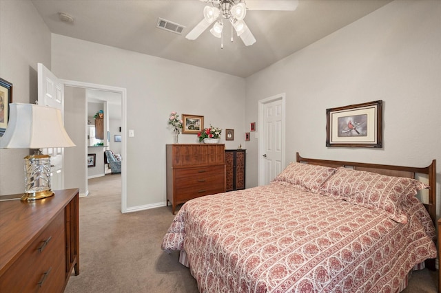 bedroom featuring ceiling fan and light carpet